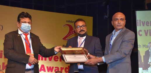 Mr. Mahesh L, Chief Technical Officer, Asset Homes receiving the Trophy and Certificate for Corona Warriors Award.